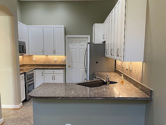 Kitchen from eat in area