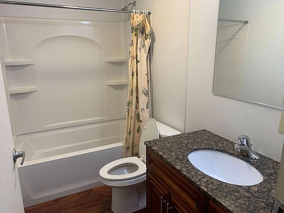 Bathroom with granite countertop