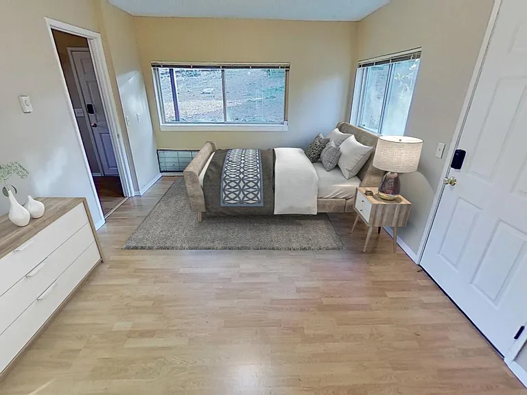 Bedroom 6. This image shows a virtually furnished space. Bedrooms come unfurnished.