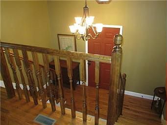 BEAUTIFUL ENTRY DBL STAIRCASE - HARDWOOD FLOORING