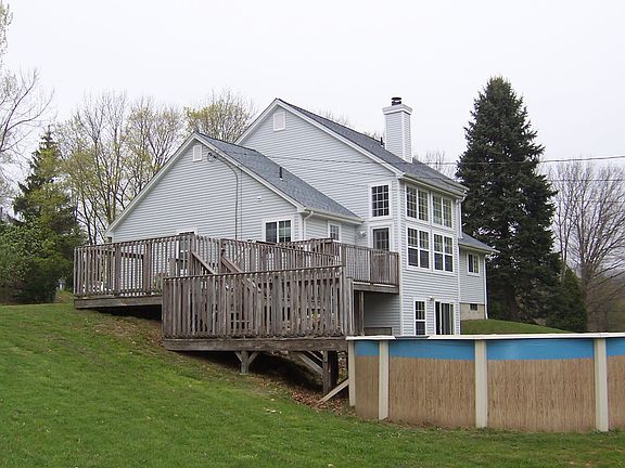 side view showing pool and deck