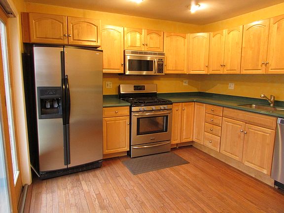 Updated eat in kitchen with stainless steel appliances