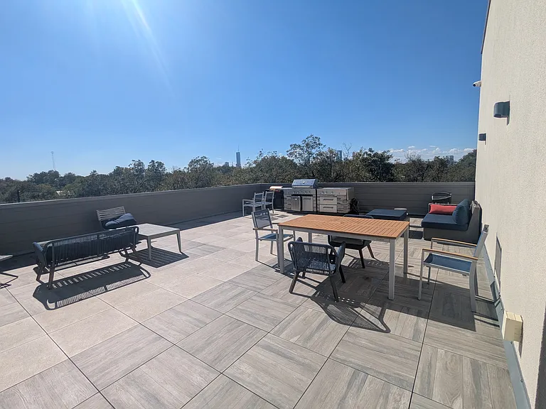 Community rooftop terrace with included BBQ grill