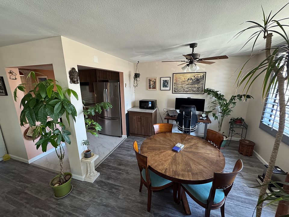 Dining area adjacent to kitchen. External window visible on right side of picture.