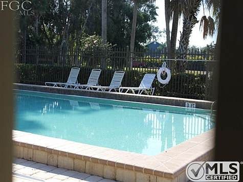 Community pool across the street from the rear of the lot.