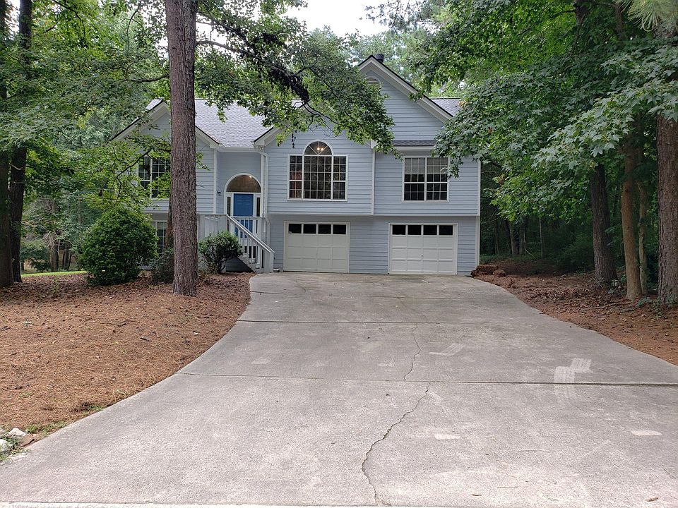 Front view, house set back nicely from road.