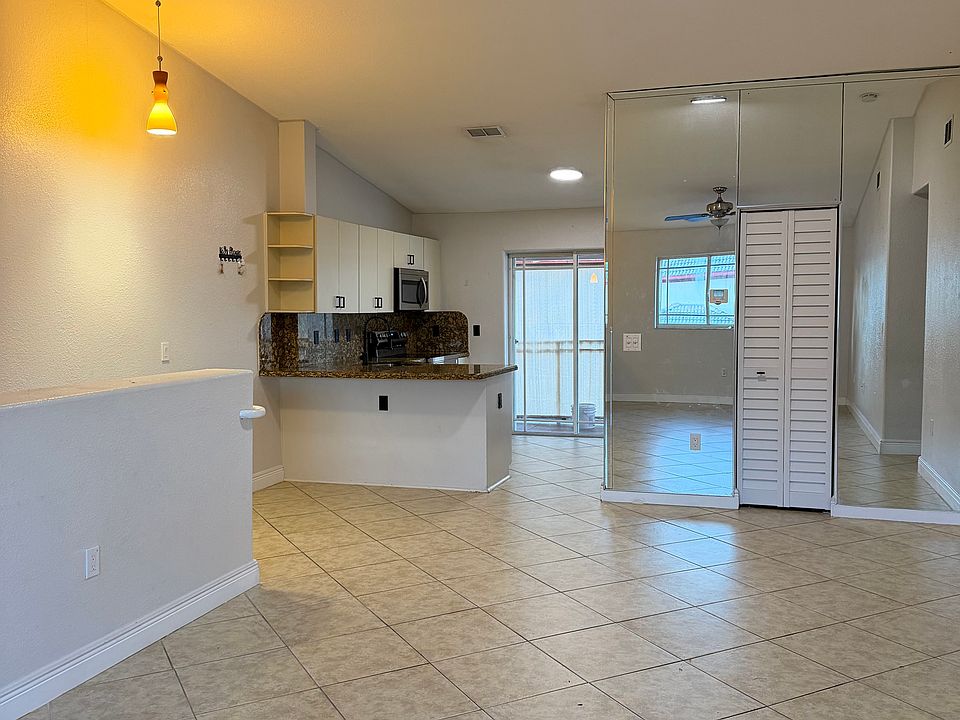 1st image of 10921 W Okeechobee Rd Unit 202