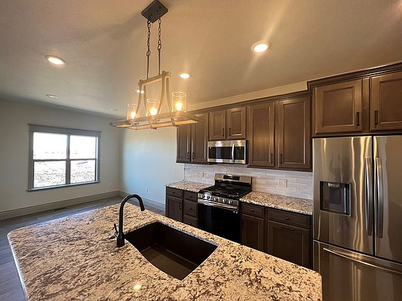 5th image of 2506 Woodwind Ct