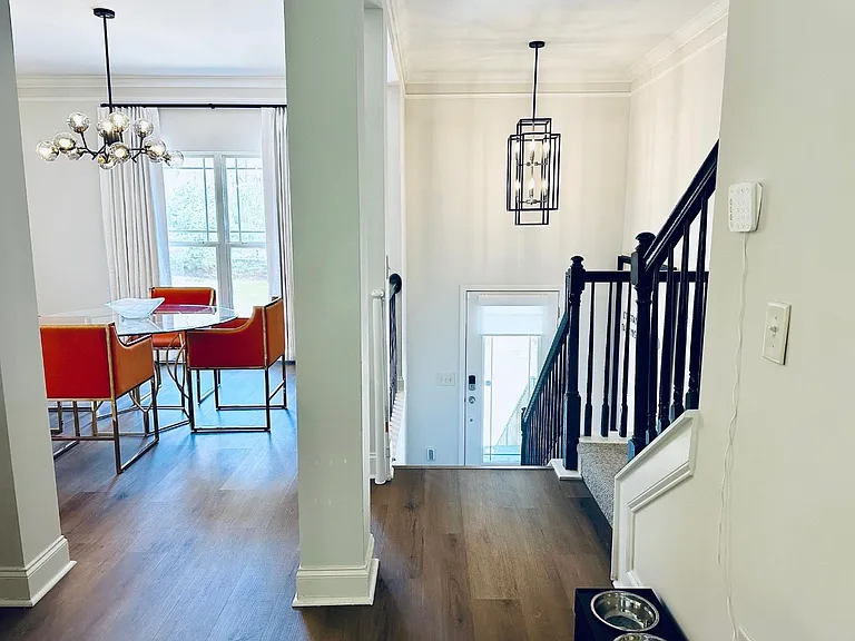 Front door going up to living area