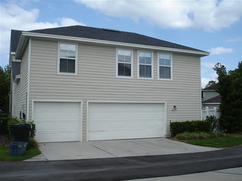 Apartment is located above a 3-car garage in a quiet residential neighborhood.