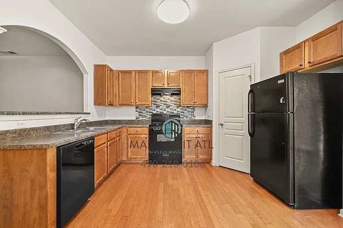 6185 Elmshorn Way — Photo 11