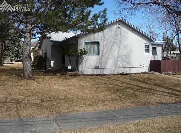 Well kept corner lot with sprinkler system, established trees and beautiful perennials.