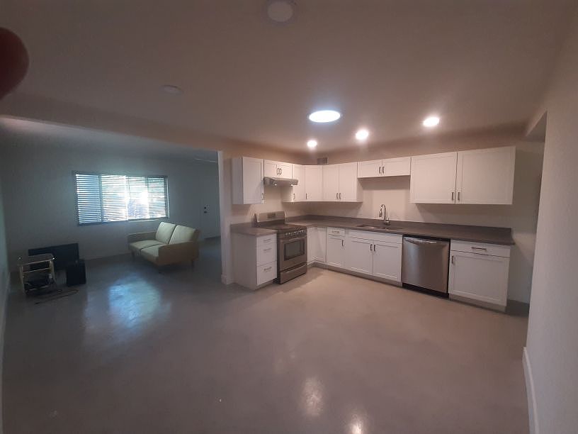 kitchen and living room beyond from dining area