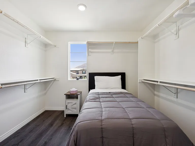 Drift off in this charming bedroom, complete with fresh linen.