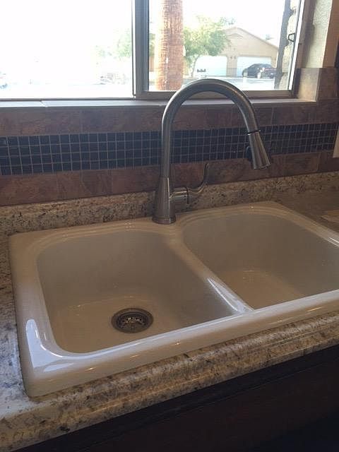 Deep sink with new faucet and garbage disposal