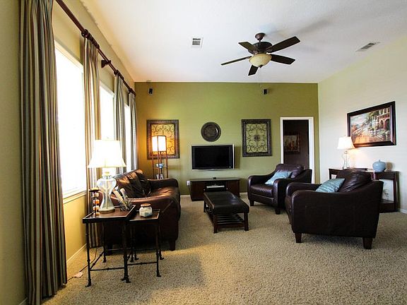 Spacious family room featuring 10 ft ceilings