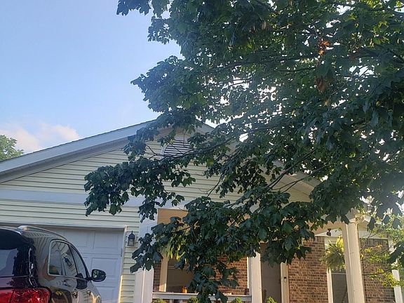 Front of house, attached 1 car garage