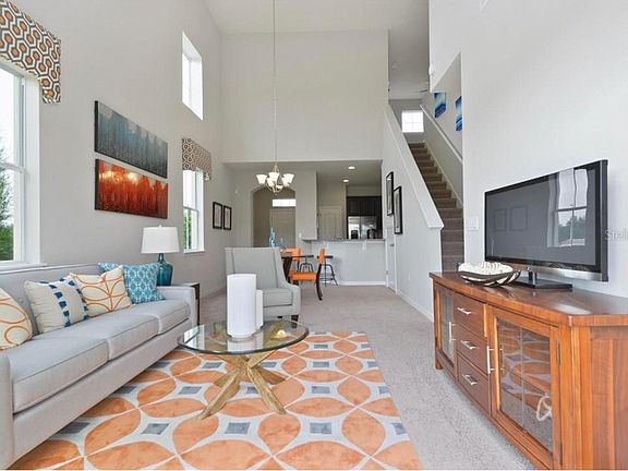 Model living room, our unit has tile in this great room