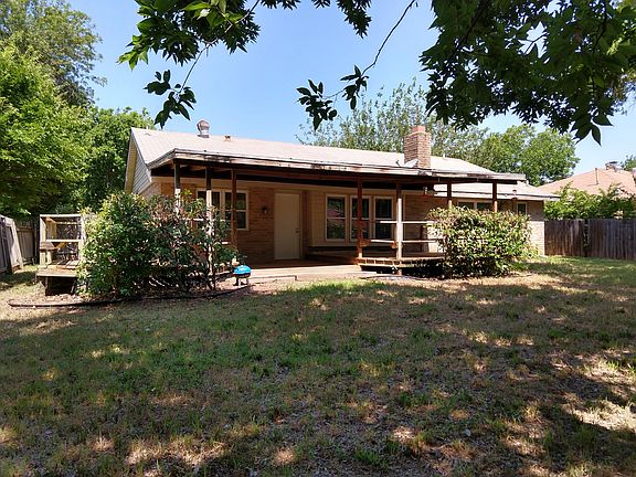 HUGE split level deck and backyard with beautiful shade tree