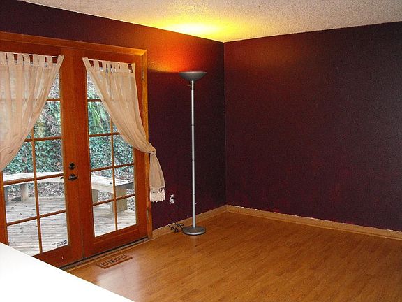 Family Room adjoins kitchen and has french doors to back deck
