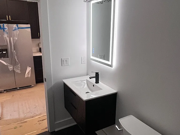 Designer finishes: modern floating bathroom vanities, custom tile shower surrounds and flooring, and high end finishes are featured in each spacious bathroom.