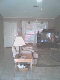 updated living 2006 with new tile, plantiation blinds, and paint