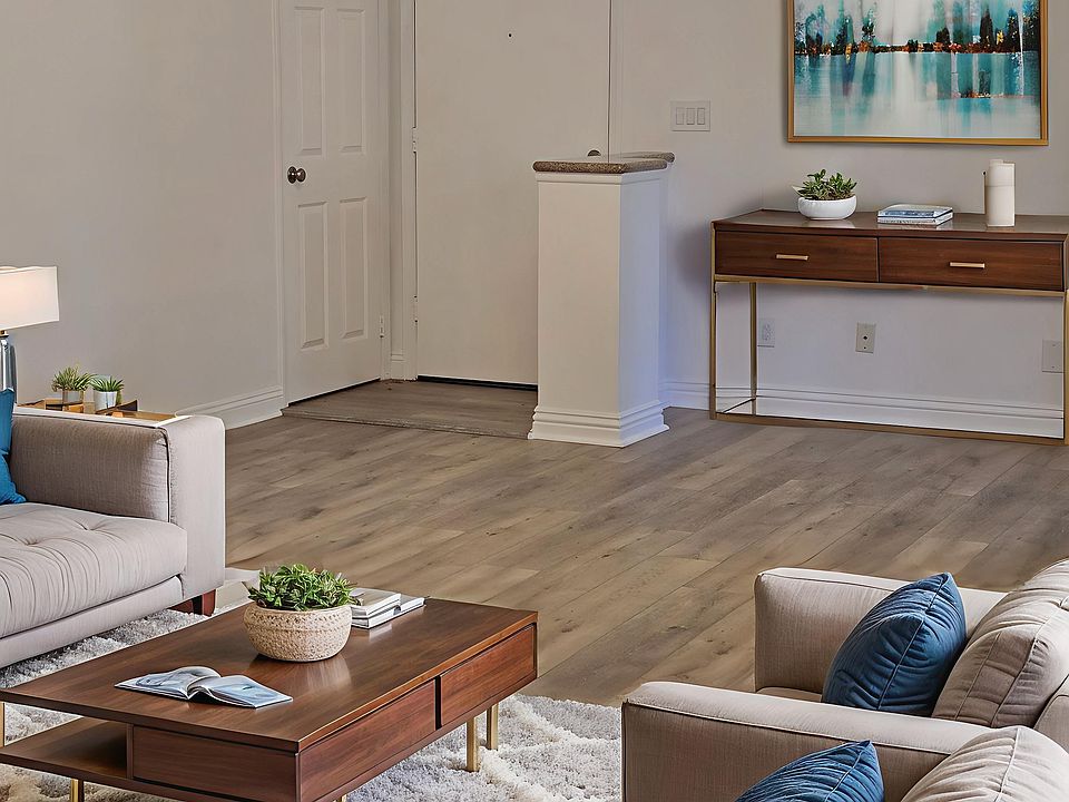 Livingroom (in another angle) is virtually staged