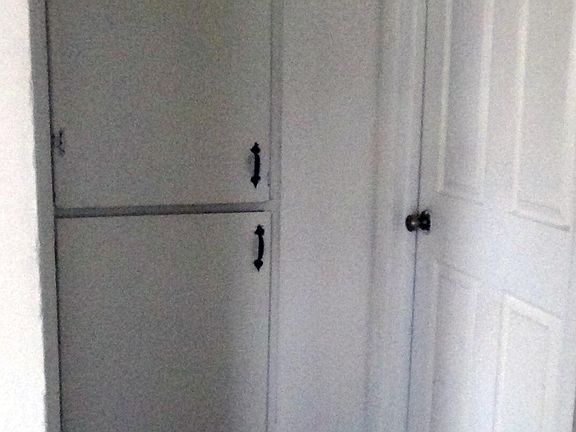 Hall with linen closet.