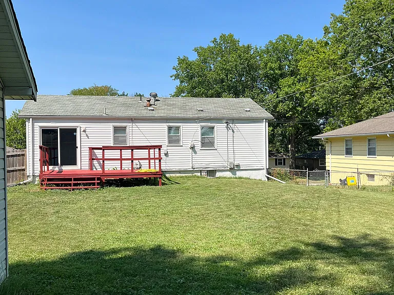 View of home from south side (large deep and wide yard)