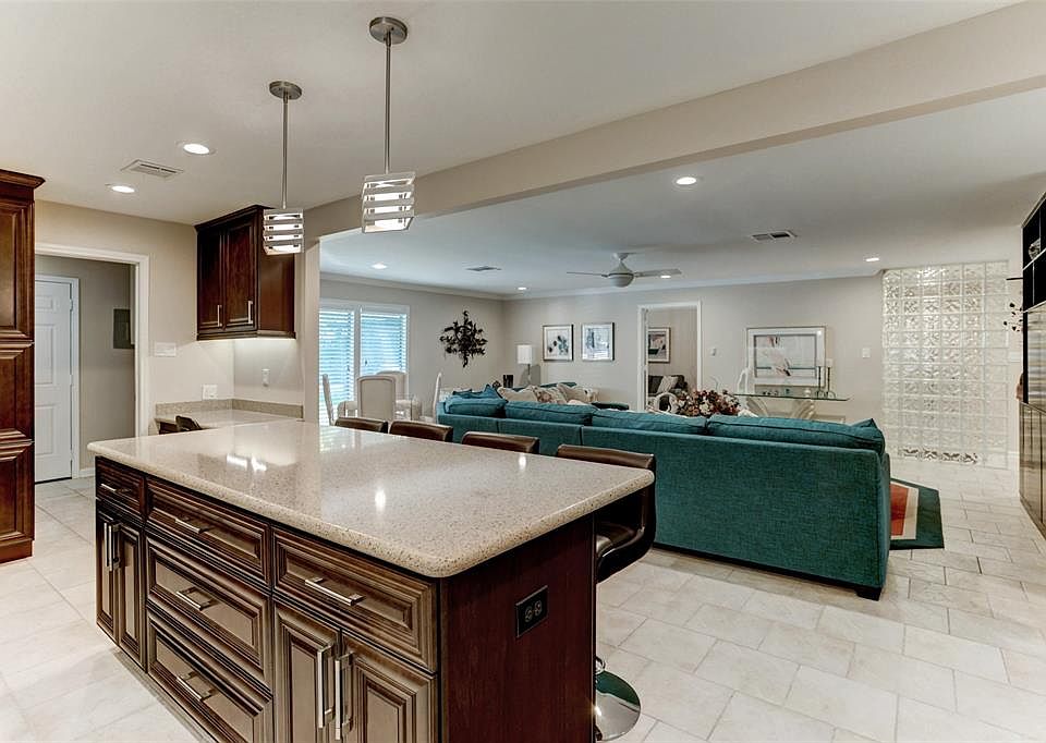 Great kitchen Island of Silestone and this Island features electricity and storage