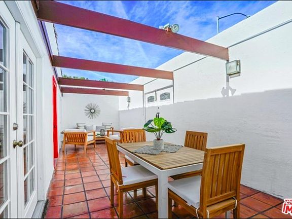 Tiled front courtyard view