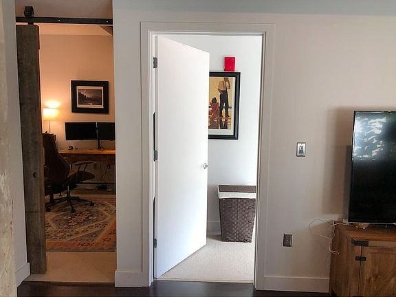 Den/office on left, bedroom on right