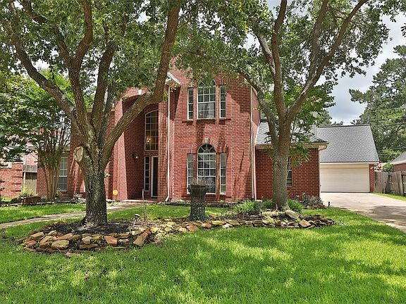 You will love this beautifully shaded front yard.