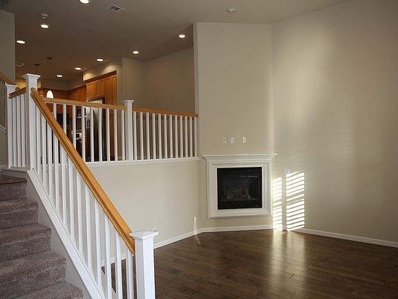 Living Room with background o Dining Room and Kitchen