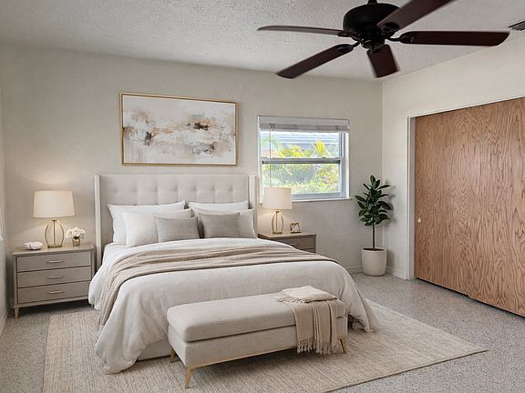 Virtual staging of primary bedroom, it has 2 closets.