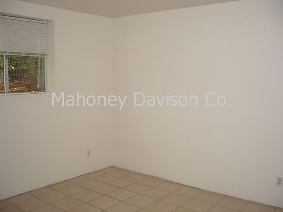bedroom with tile floor