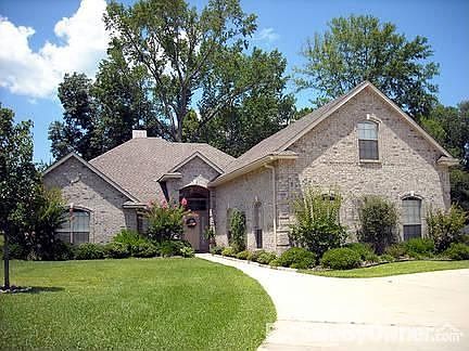 FRONT OF HOME : ON CITY TAXES - CIRCLE DRIVERWAY