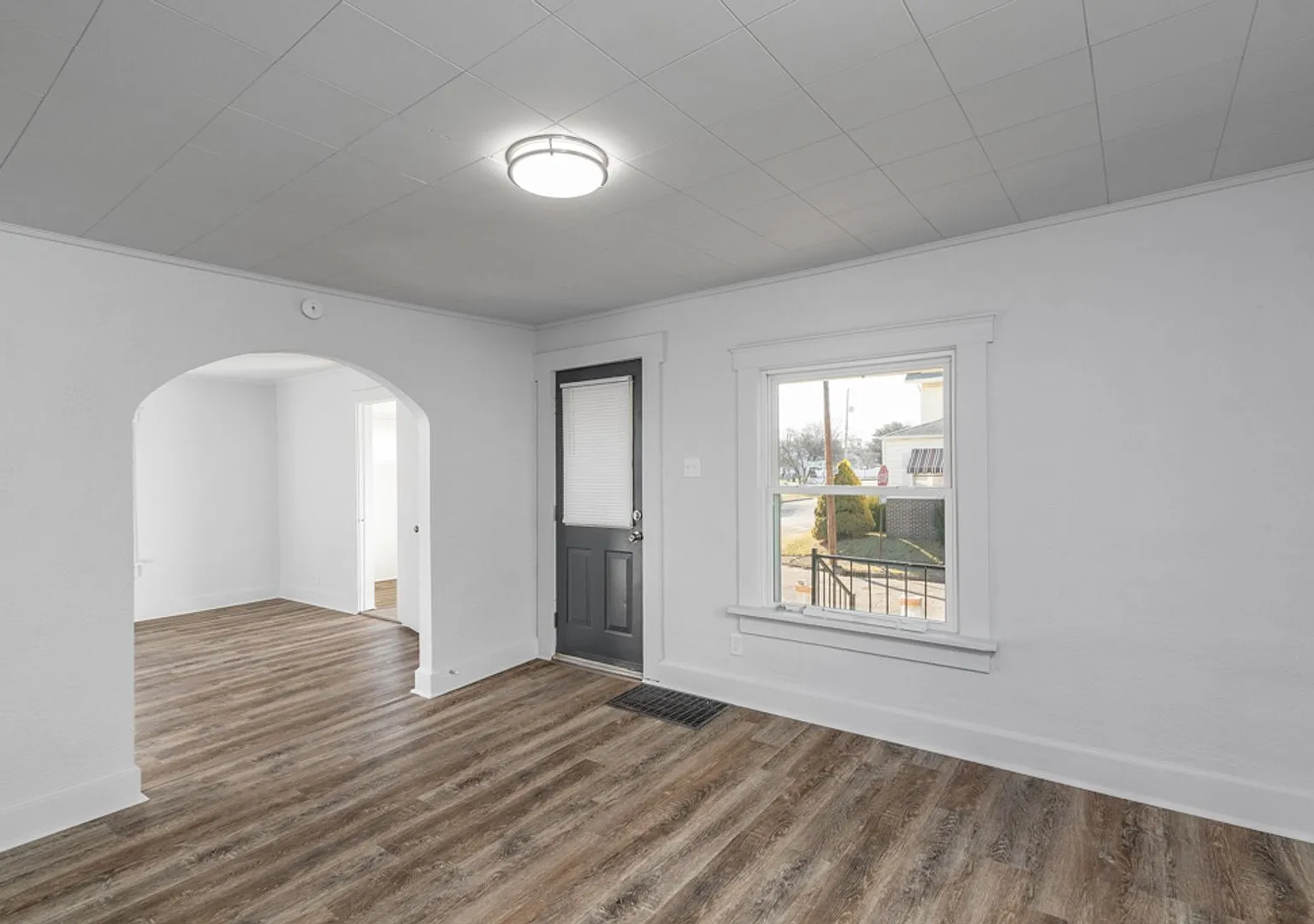 Move-in Ready 3BR/1BA with Garage, Deck & Large Basement! - 1904 Taft Ave NE — Photo 4