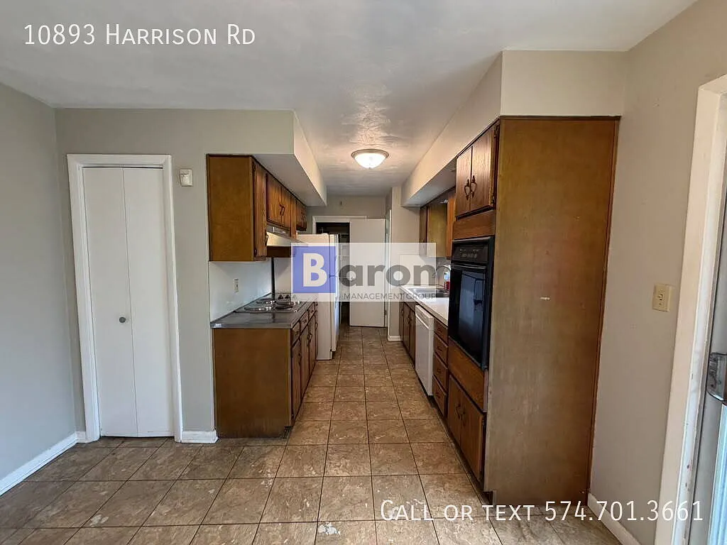 "Charming 3-Bedroom Home with Scenic Views at 10893 Harrison Rd — Photo 4