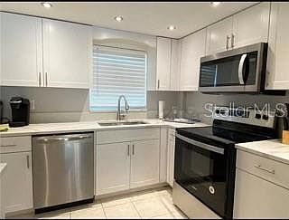 5th image of 4650 Cove Cir APT 210