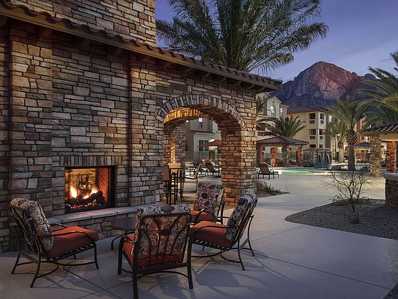Enjoy poolside fireplaces and flat screen TVs