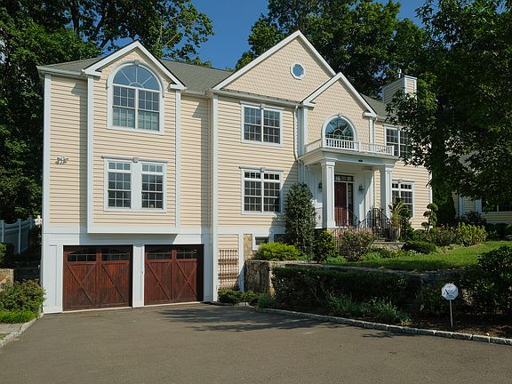 Handsome stone retaining walls and Belguim block that line the driveway and walkways