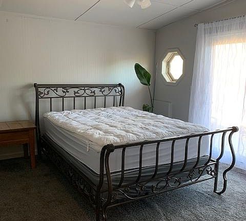 Second master bedroom with patio doors