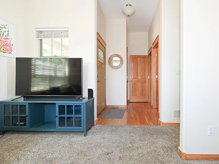 High ceilings and large windows flood the rooms with natural light