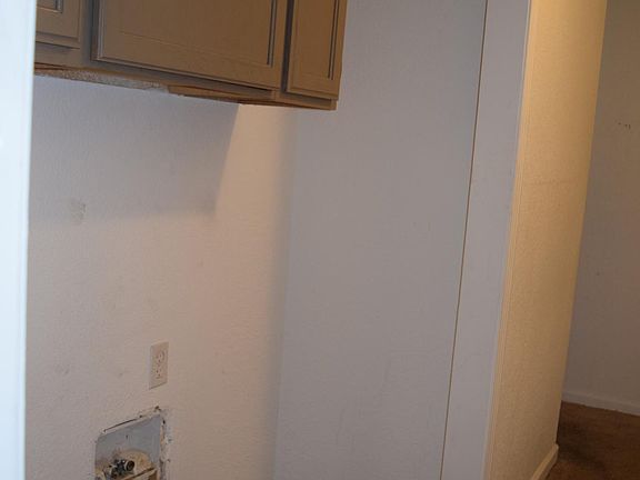Washer and Dryer Hook Ups with Cabinet Space
