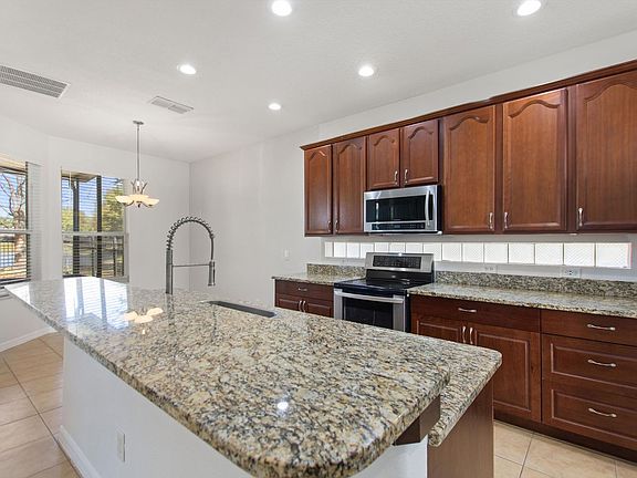 5th image of 9020 Pecky Cypress Way