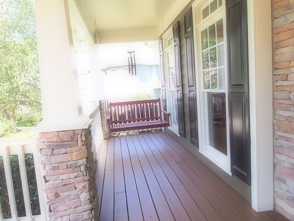 Covered front porch swing