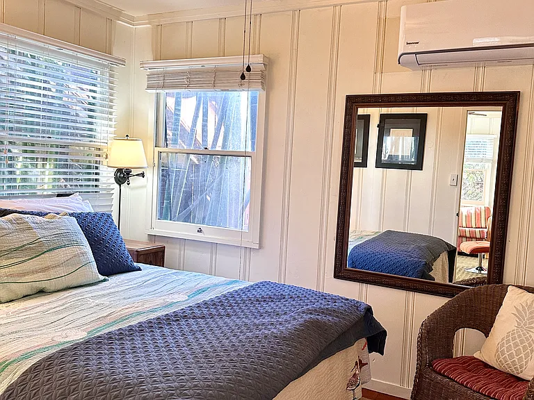 bedroom with queen size bed and brand new mini-split AC and Heat