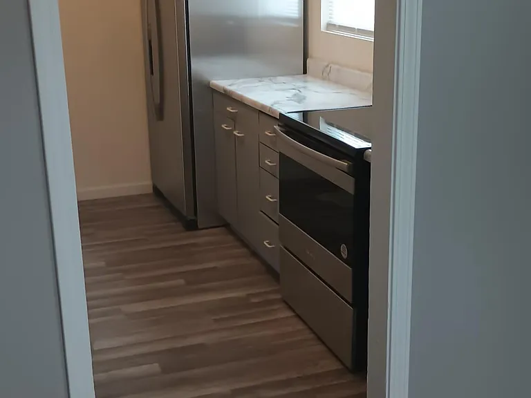 Living room facing kitchen