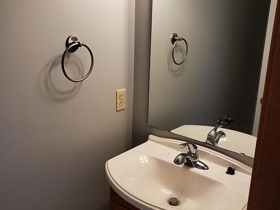 Half bathroom (2 piece) off of front door entryway.